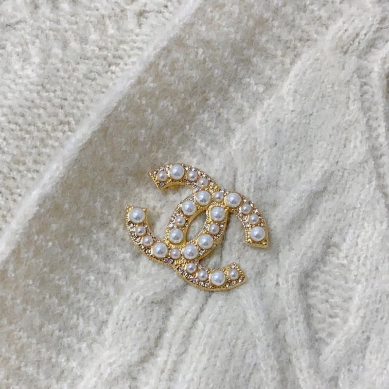 Ch*el brooches